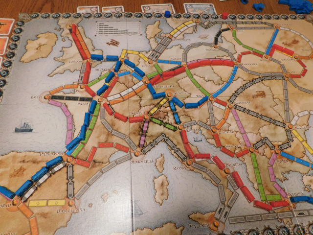 Photo of the board of Ticket to Ride with a game in progress.